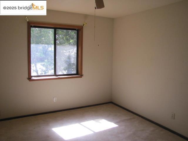 20280 Little Valley Road Groveland, CA 95321 - Photo 19 of 32 an empty room with a window