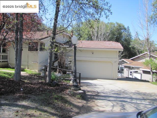 20280 Little Valley Road Groveland, CA 95321 - Photo 2 of 32 a house view with a backyard space
