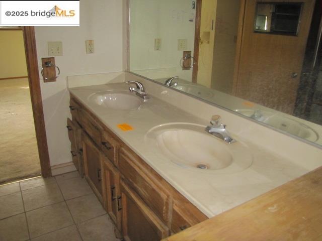 20280 Little Valley Road Groveland, CA 95321 - Photo 23 of 32 a bathroom with a sink and a mirror