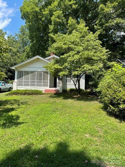 1036 Ridge Avenue Gastonia, NC 28052 - Photo 1 of 11 a front view of a house with a yard