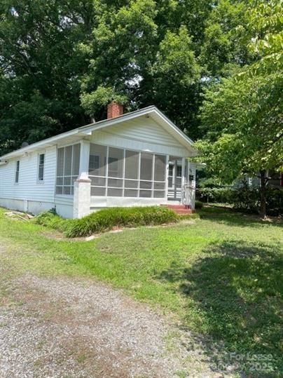 1036 Ridge Avenue Gastonia, NC 28052 - Photo 2 of 11 a front view of house with yard and green space