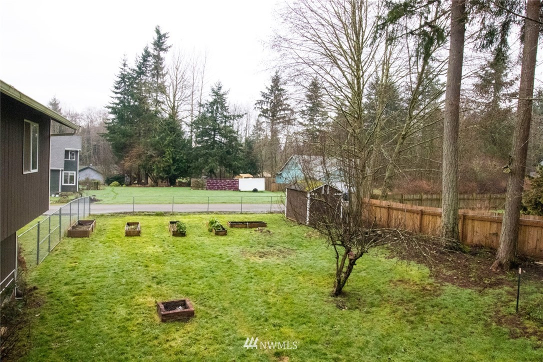 214 Fern Meadows Loop Southeast Port Orchard, WA 98366 - Photo 16 of 23 a view of a golf course with chairs