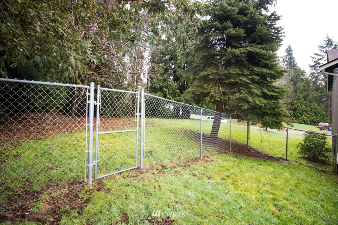 214 Fern Meadows Loop Southeast Port Orchard, WA 98366 - Photo 20 of 23 a view of a garden