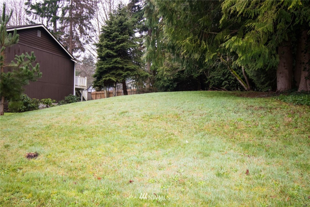 214 Fern Meadows Loop Southeast Port Orchard, WA 98366 - Photo 22 of 23 a view of a backyard