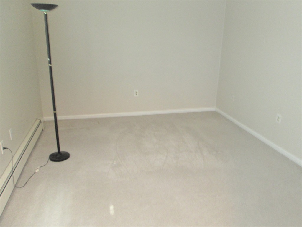 32 Lantern Lane, Unit 8 Dracut, MA 01826 - Photo 11 of 14 a view of an empty room
