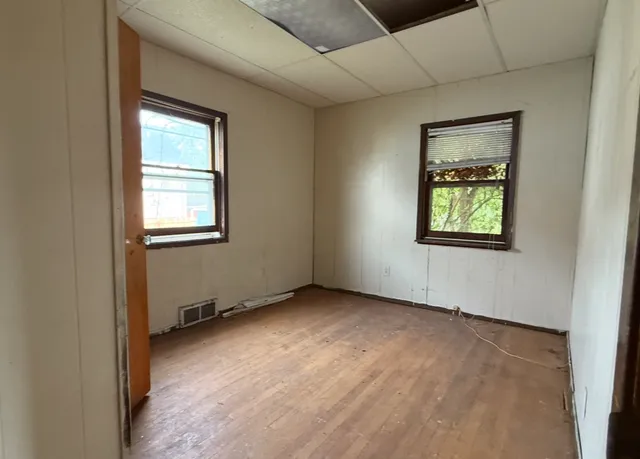 an empty room with windows