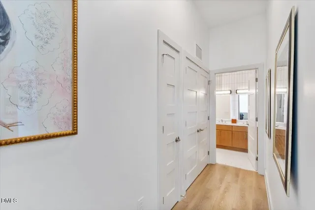 a bathroom with a tub and shower