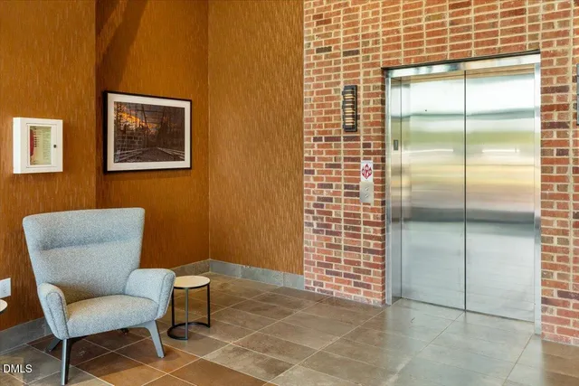 a blue and white room with a chair