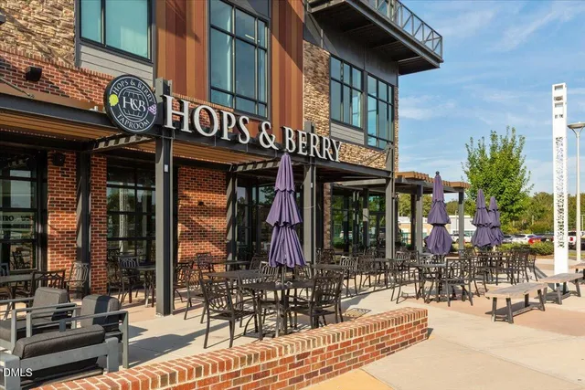 a view of cafe with outdoor sitting area