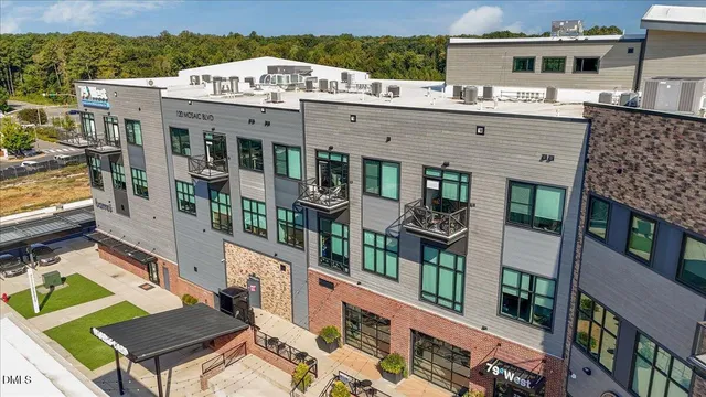 a front view of a building with street view
