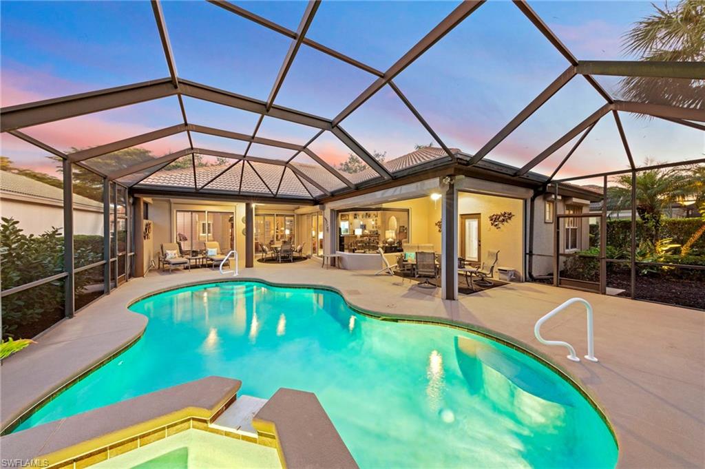 a view of a swimming pool with a patio