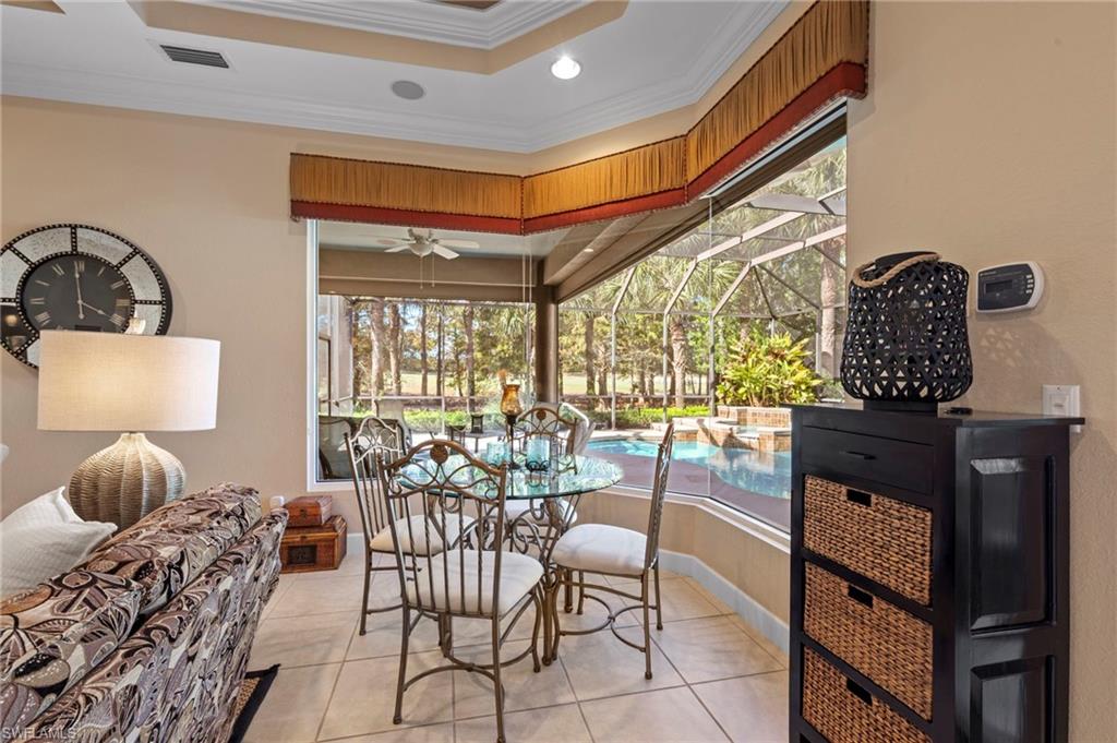 20042 Buttermere Court Estero, FL 33928 - Photo 21 of 47 a living room with furniture and a window