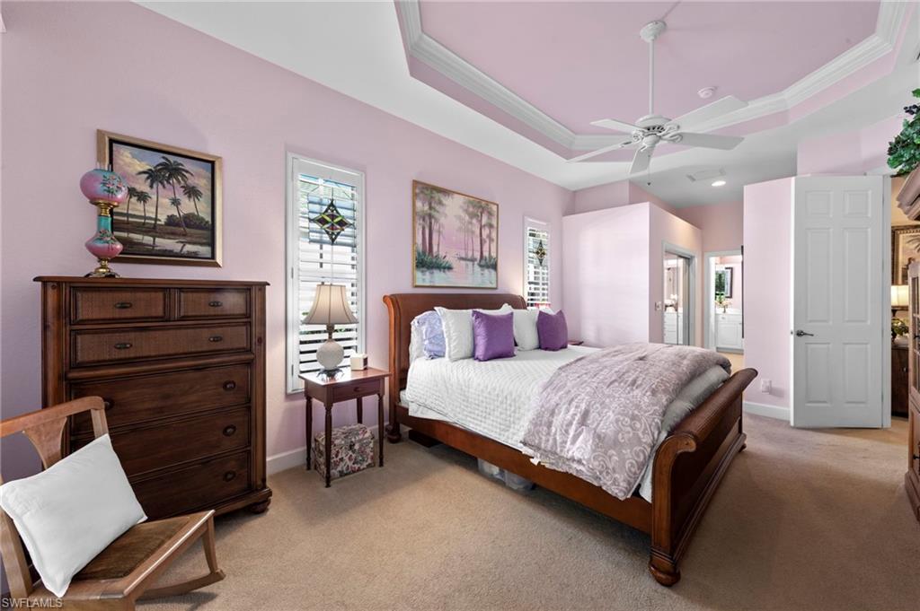 20042 Buttermere Court Estero, FL 33928 - Photo 28 of 47 a bedroom with a bed and furniture