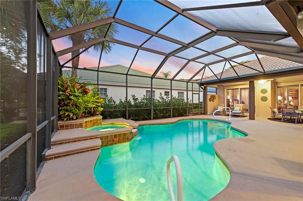 20042 Buttermere Court Estero, FL 33928 - Photo 35 of 47 a view of a swimming pool with a patio