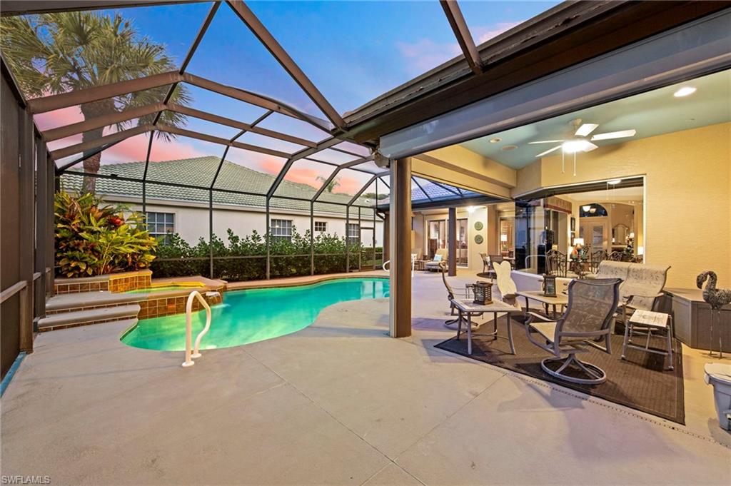 20042 Buttermere Court Estero, FL 33928 - Photo 36 of 47 a view of a patio with a table and chairs
