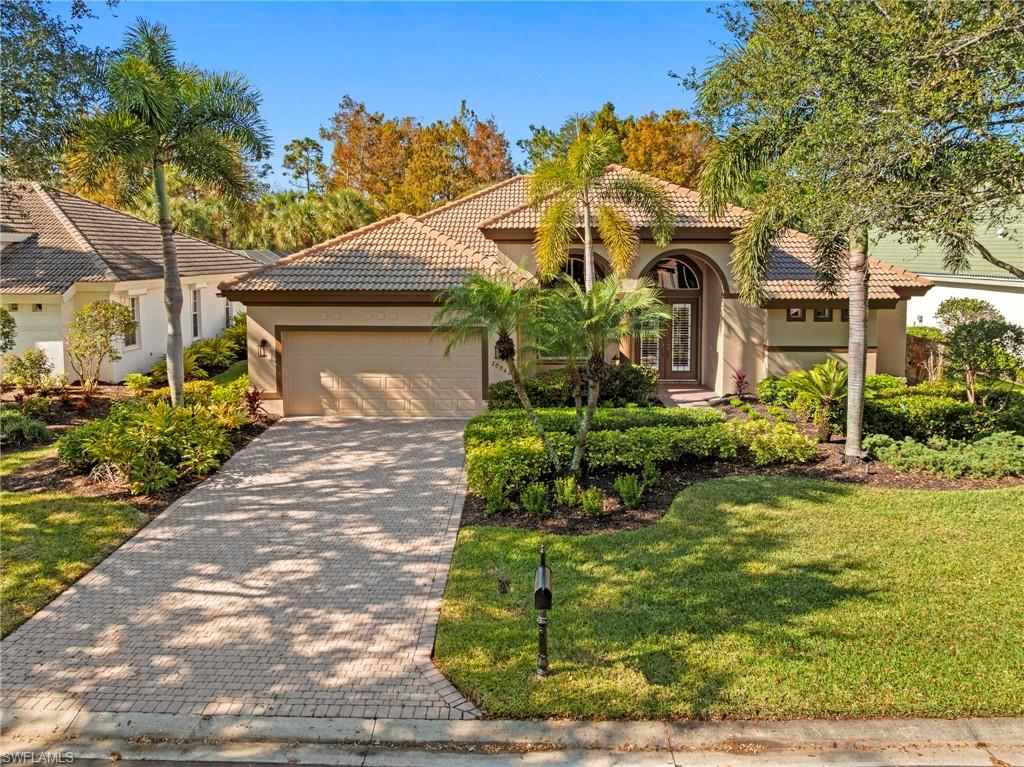 20042 Buttermere Court Estero, FL 33928 - Photo 39 of 47 a front view of a house with garden
