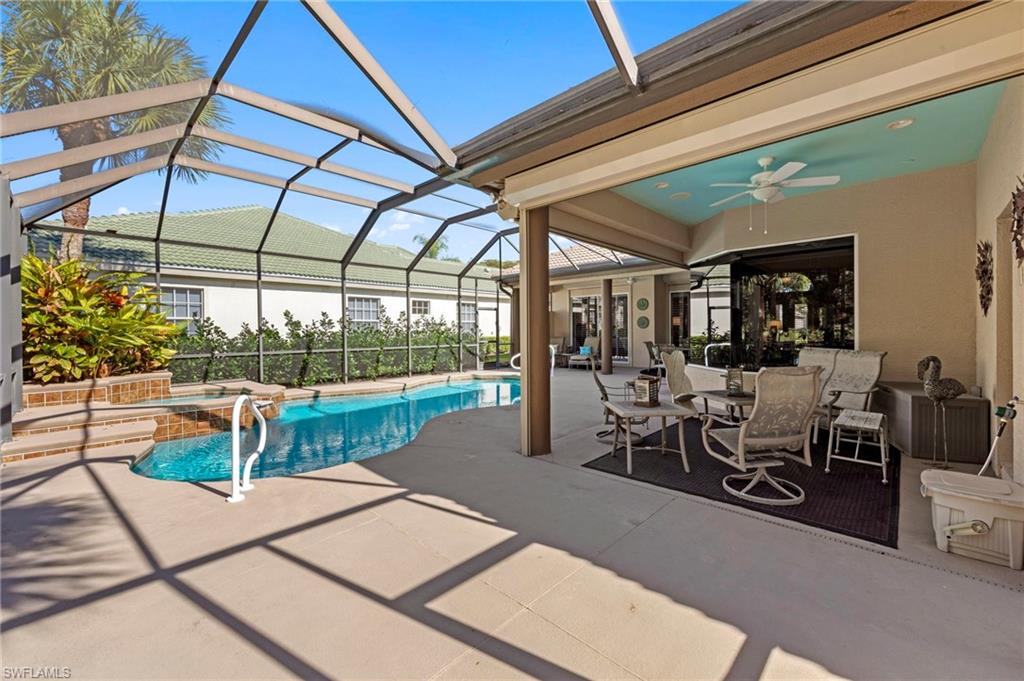 20042 Buttermere Court Estero, FL 33928 - Photo 4 of 47 a view of a swimming pool with a bench in patio
