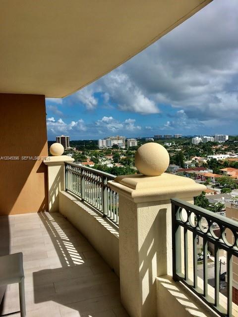 3232 Southwest 22nd Terrace, Unit 1303 Miami, FL 33145 - Photo 3 of 43 a view of balcony with two chairs