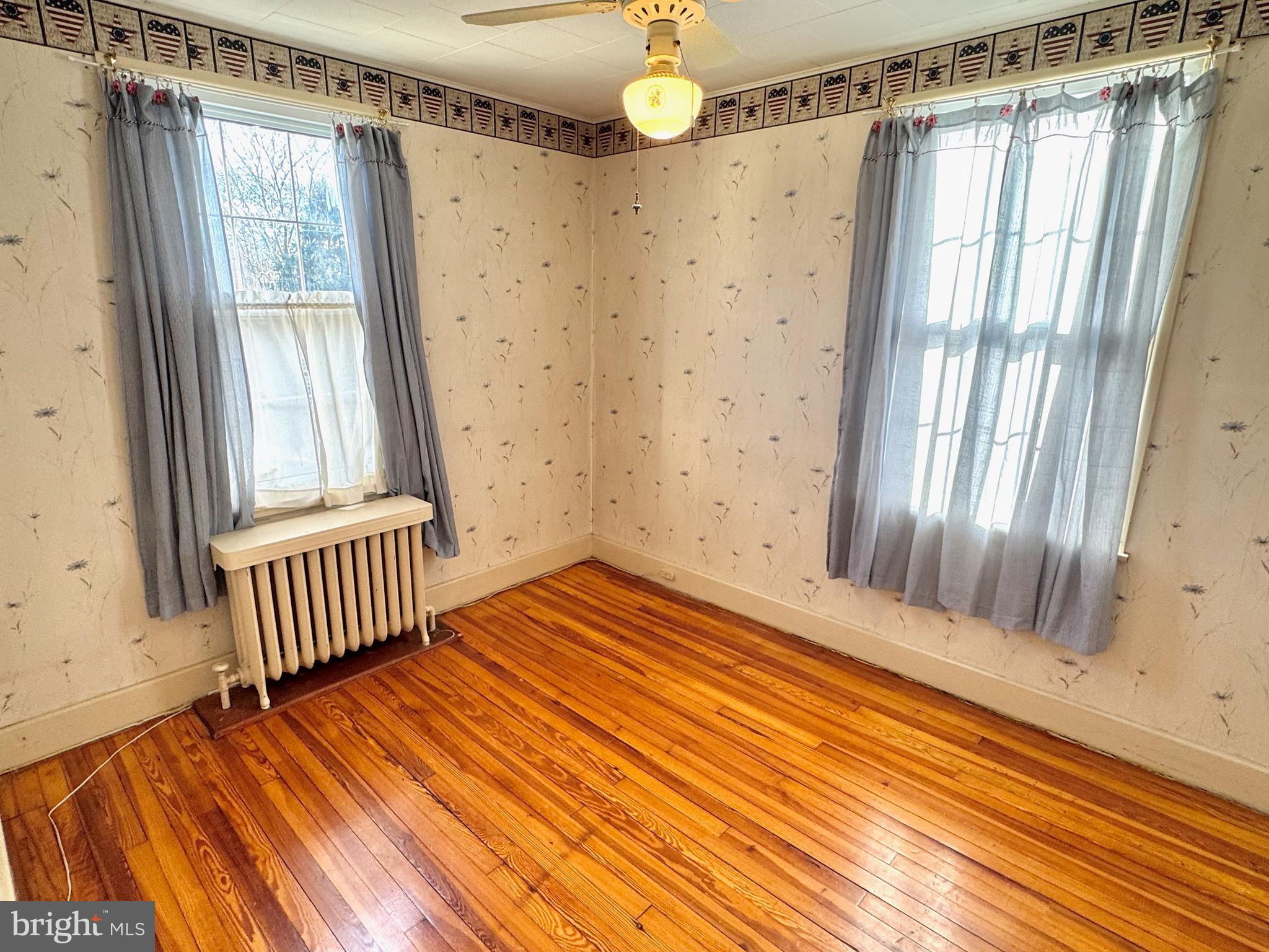331 Sunset Road Reading, PA 19611 - Photo 16 of 32 a view of a room with wooden floor and staircase