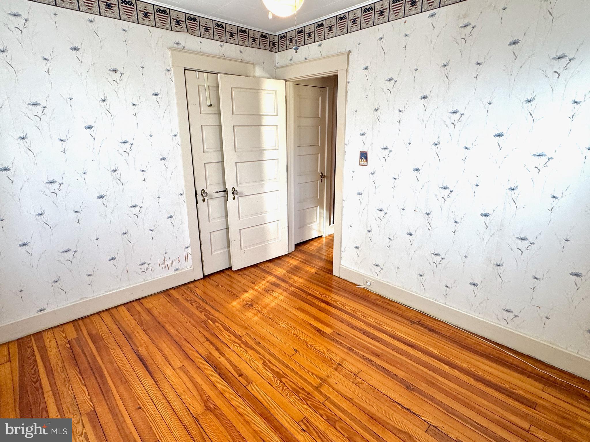 331 Sunset Road Reading, PA 19611 - Photo 17 of 32 a view of a room with wooden floor