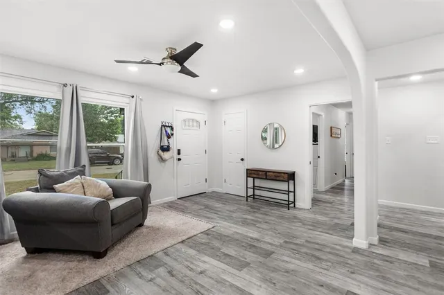 a bedroom with furniture and windows