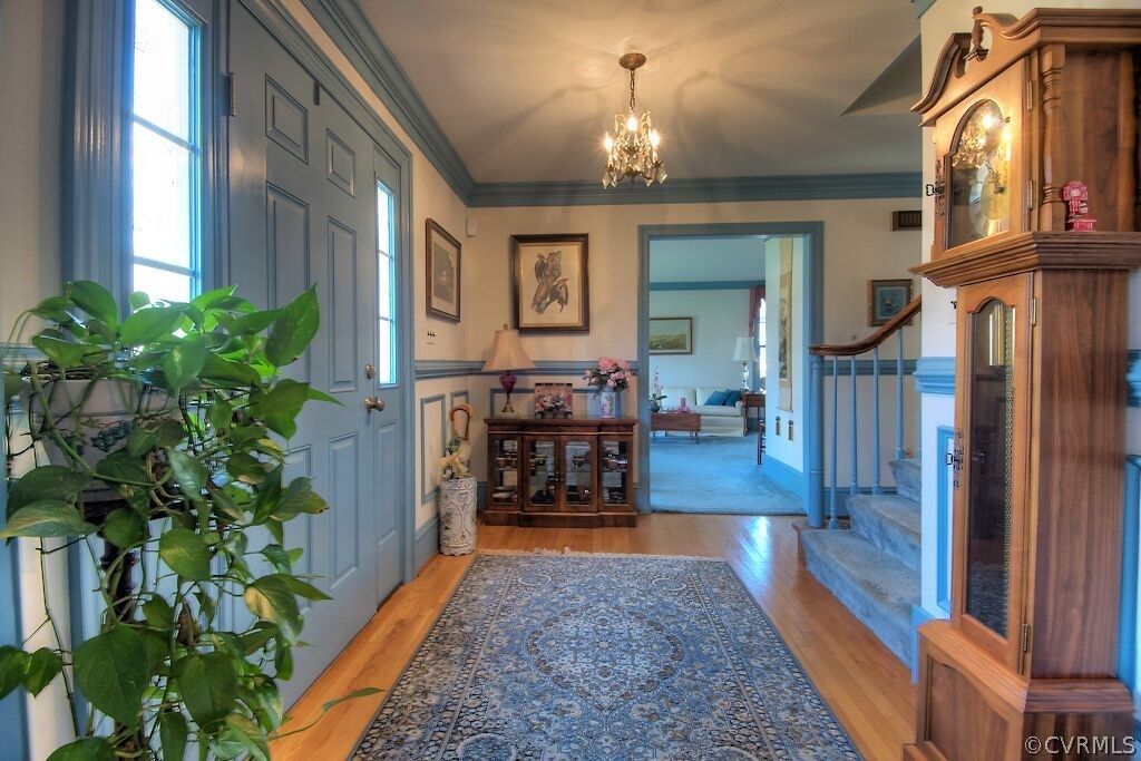 14011 Helmsley Road Midlothian, VA 23113 - Photo 20 of 43 a view of living room kitchen and entryway