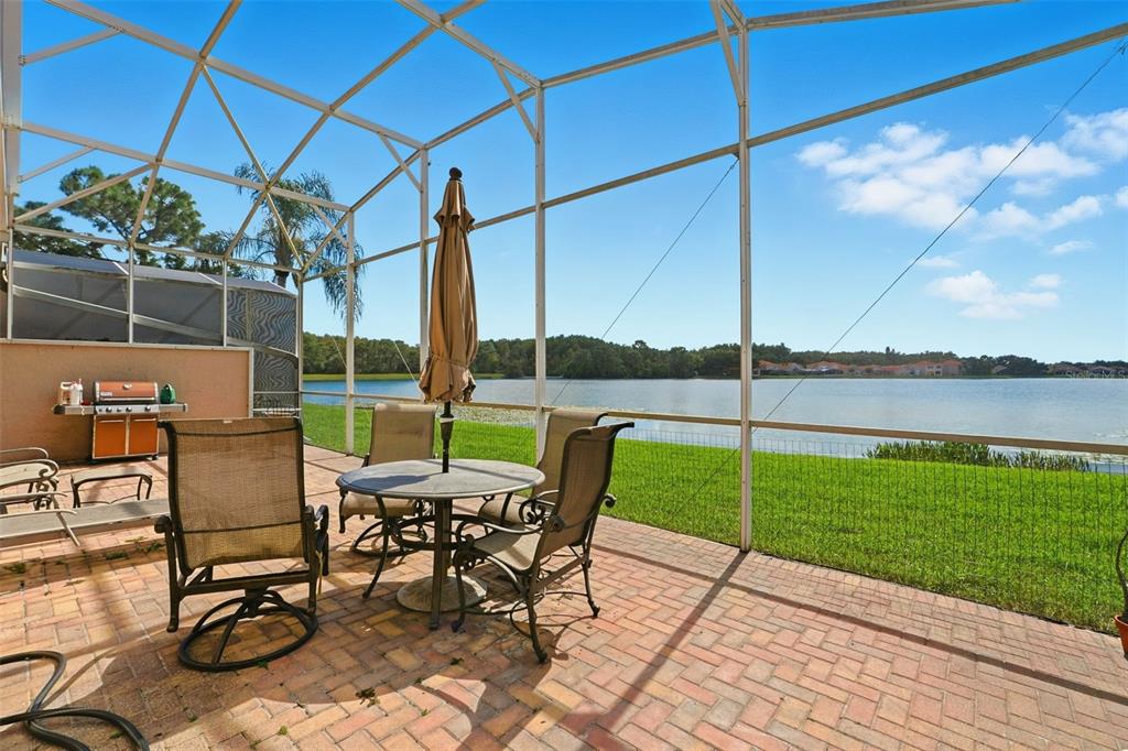 4870 Watervista Drive Orlando, FL 32821 - Photo 31 of 36 a view of a backyard with sitting area