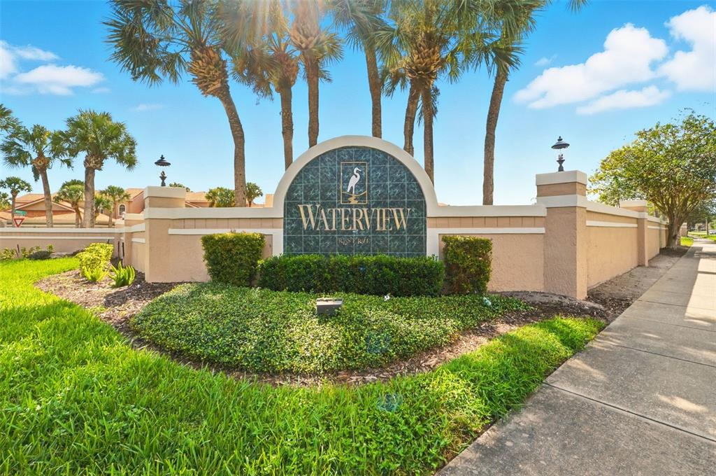 4870 Watervista Drive Orlando, FL 32821 - Photo 34 of 36 a view of a garden