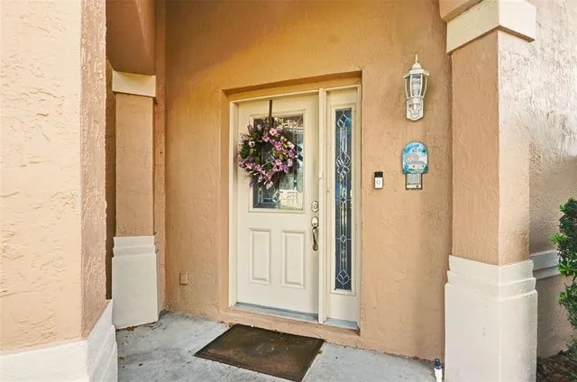 a view of a hallway with paintings on the wall