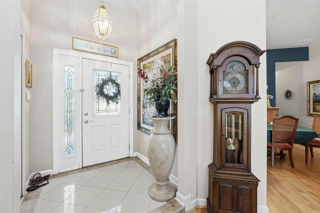 4870 Watervista Drive Orlando, FL 32821 - Photo 7 of 36 a view of living room with furniture and wooden floor