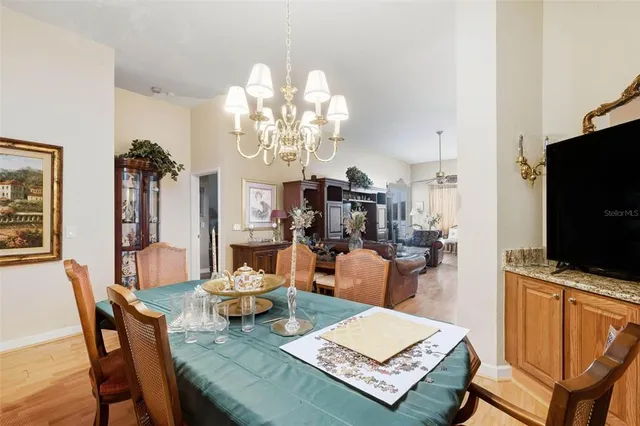 a living room with fireplace furniture and a flat screen tv