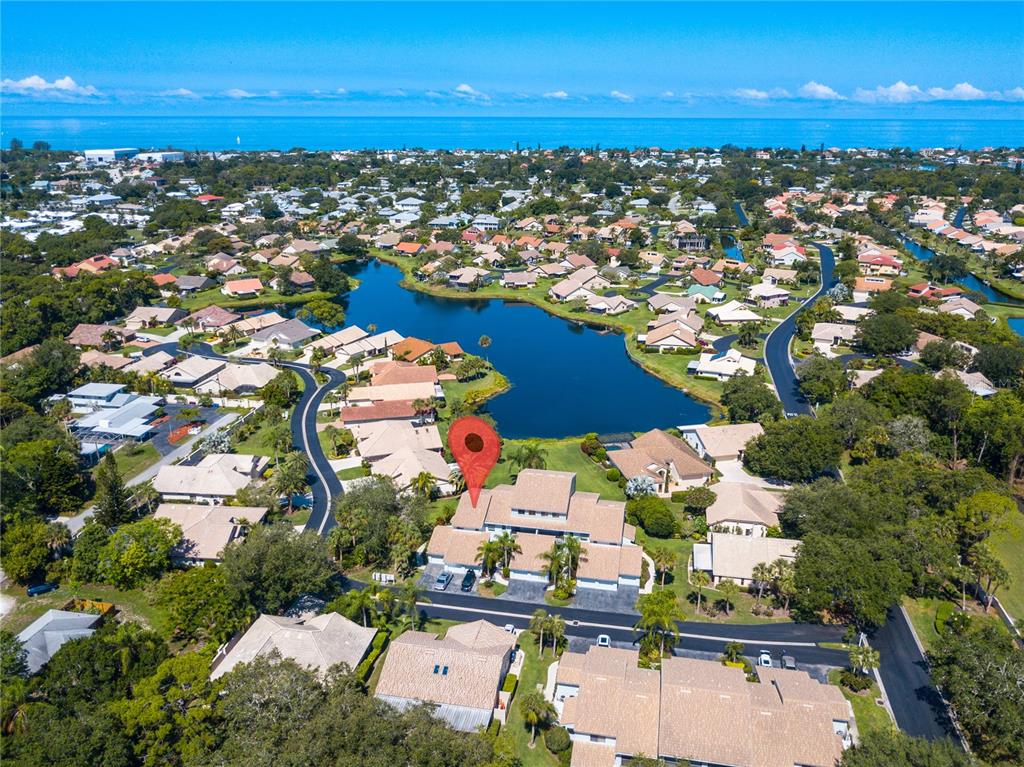 600 Carriage House Lane, Unit 201 Nokomis, FL 34275 - Photo 19 of 23 an aerial view of residential houses with outdoor space