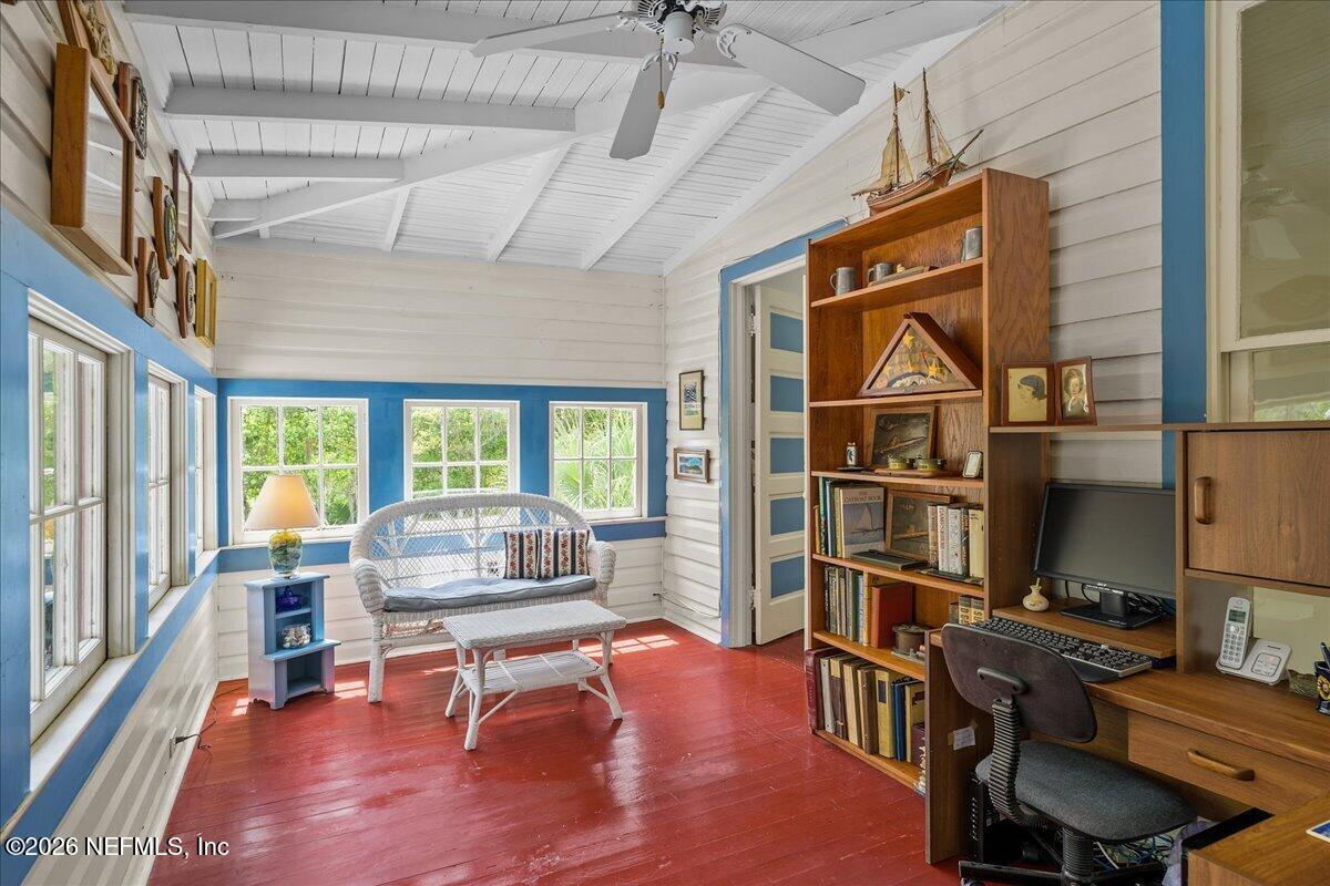 223 Madison Street Palatka, FL 32177 - Photo 30 of 60 a work room with furniture and a floor to ceiling window