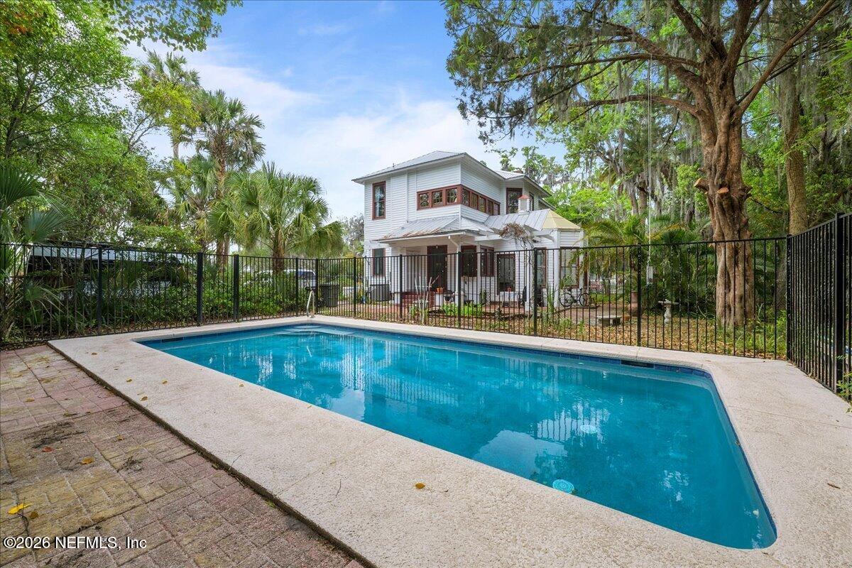 223 Madison Street Palatka, FL 32177 - Photo 37 of 60 a view of a swimming pool with a patio