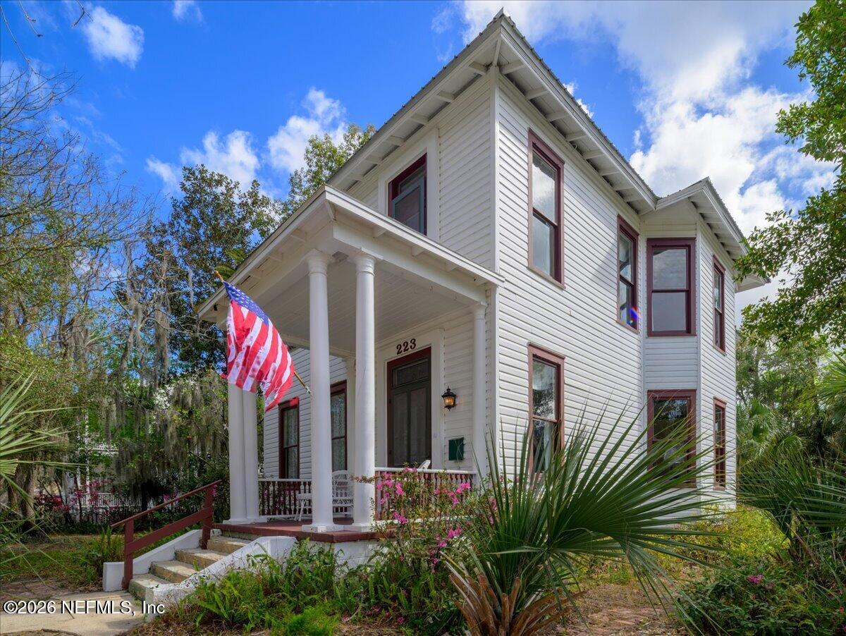 223 Madison Street Palatka, FL 32177 - Photo 39 of 60 a front view of a house with a yard