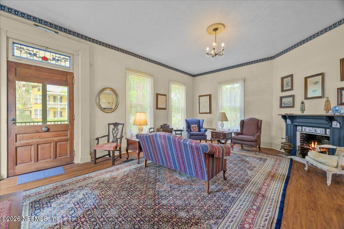 223 Madison Street Palatka, FL 32177 - Photo 6 of 60 a living room with furniture and a fireplace
