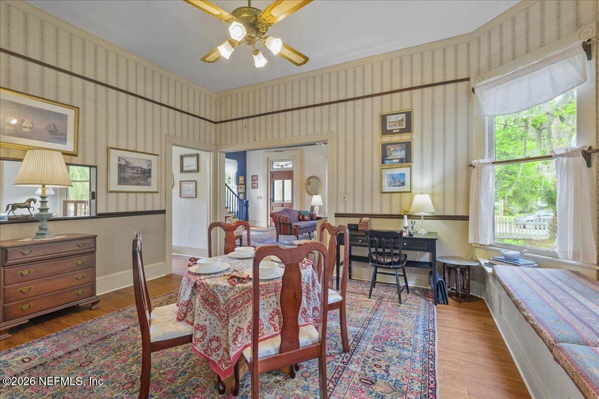 223 Madison Street Palatka, FL 32177 - Photo 10 of 60 a living room with fireplace furniture and a large window