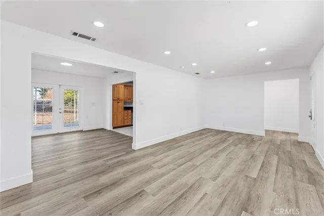 a kitchen with granite countertop a stove a sink and a granite counter tops