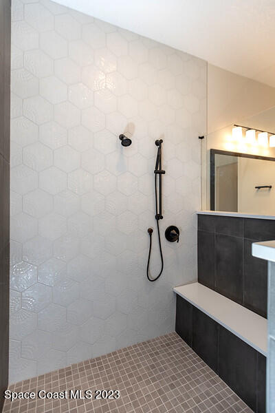 3940 Domain Court Melbourne, FL 32934 - Photo 14 of 27 a bathroom with a shower