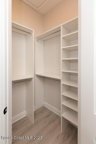 3940 Domain Court Melbourne, FL 32934 - Photo 16 of 27 a view of walk in closet with empty racks