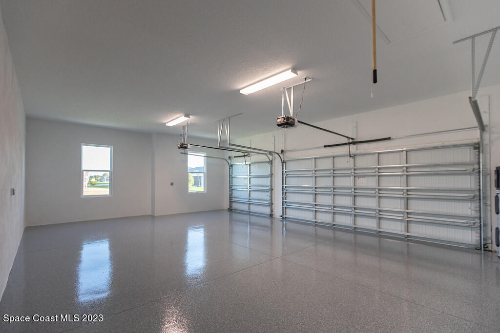 3940 Domain Court Melbourne, FL 32934 - Photo 26 of 27 a view of a livingroom with an empty space and a window
