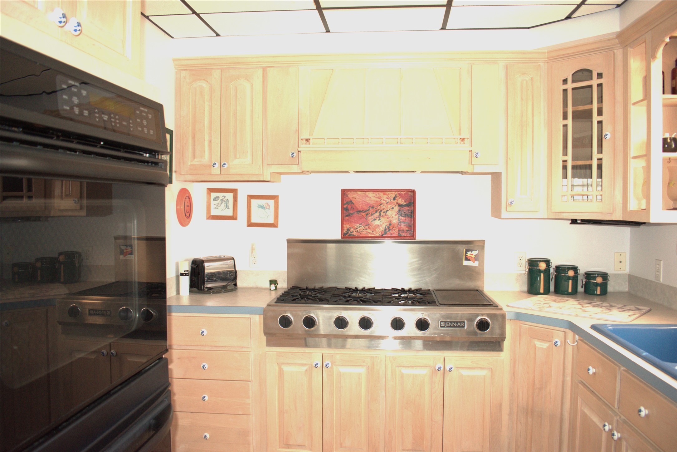 1657 County Road Sargent, TX 77414 - Photo 34 of 46 a kitchen with a stove and a microwave