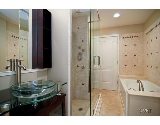 916 West Van Buren Street Chicago, IL 60607 - Photo 9 of 10 a bathroom with a sink and a mirror