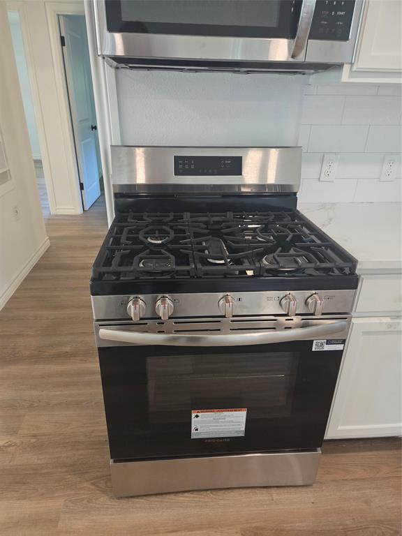 2108 Blake Avenue Dallas, TX 75228 - Photo 5 of 13 Updated gas stove