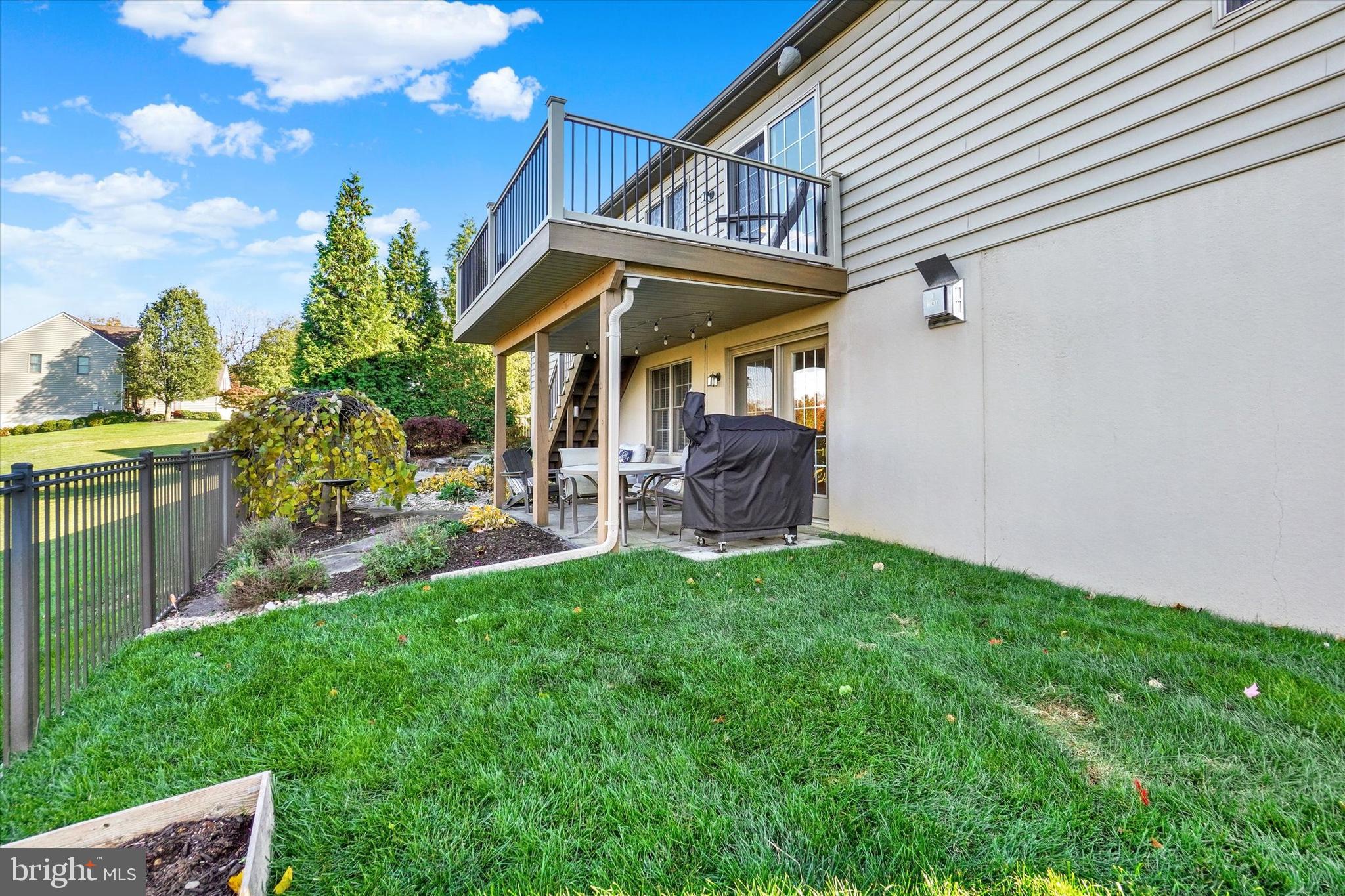 657 Campbell Road York, PA 17402 - Photo 25 of 30 a view of a chair and table in backyard of the house