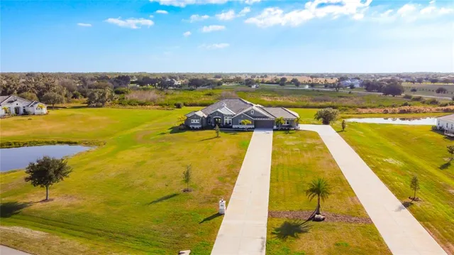 a view of a swimming pool with an ocean view