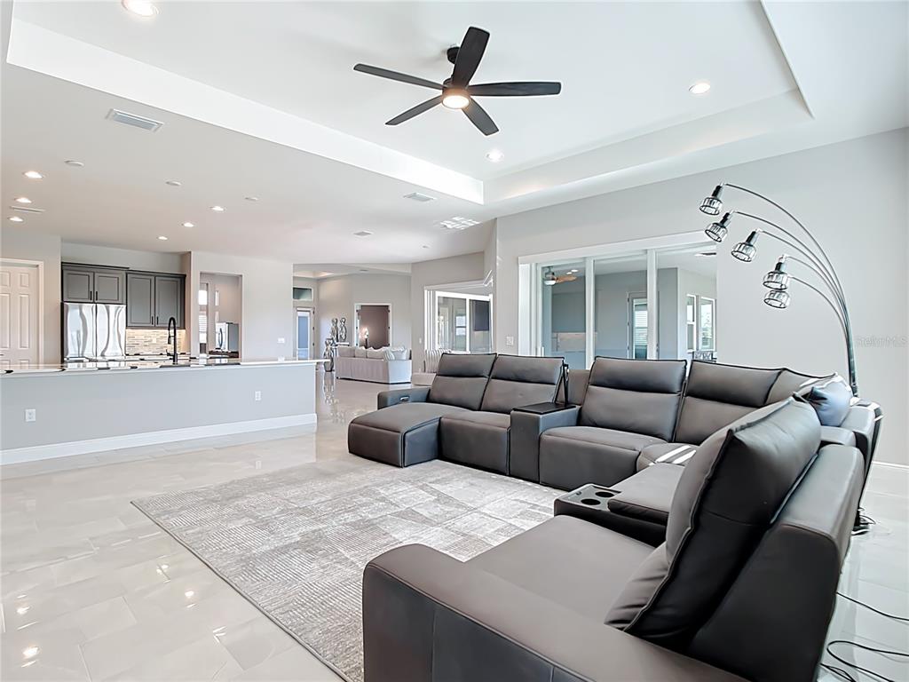 3586 Recurve Circle Sarasota, FL 34240 - Photo 22 of 66 a living room with furniture and kitchen view