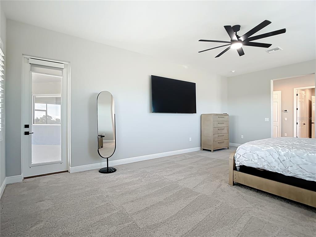 3586 Recurve Circle Sarasota, FL 34240 - Photo 27 of 66 a living room with bed and furniture