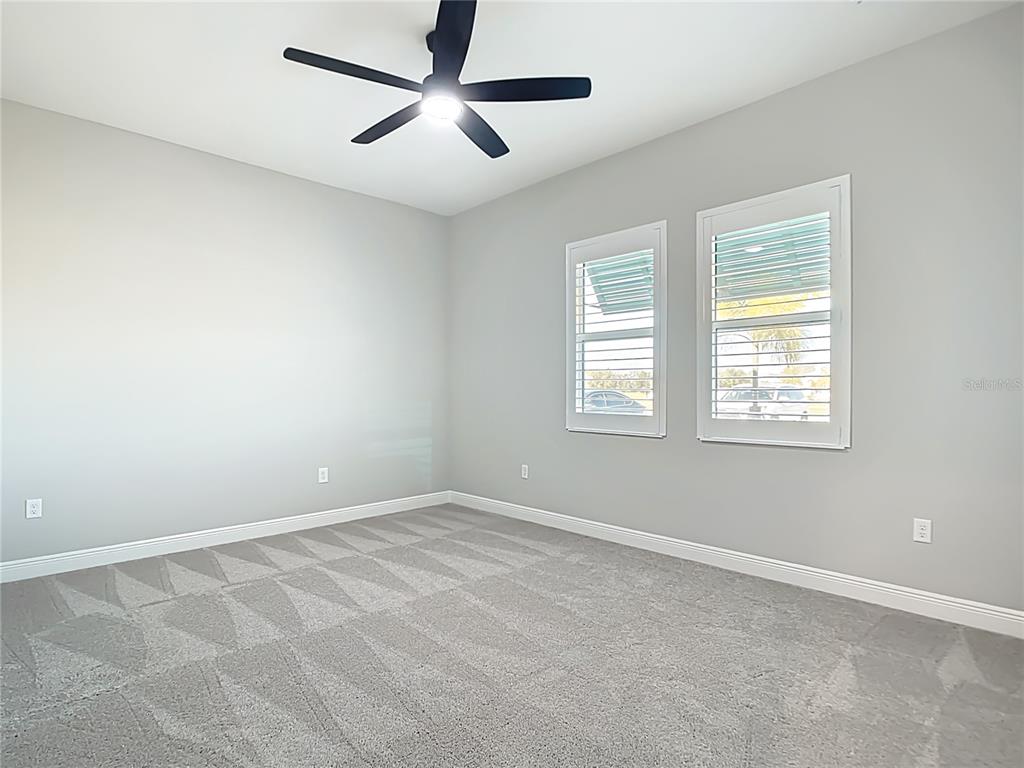 3586 Recurve Circle Sarasota, FL 34240 - Photo 35 of 65 a view of an empty room with a window