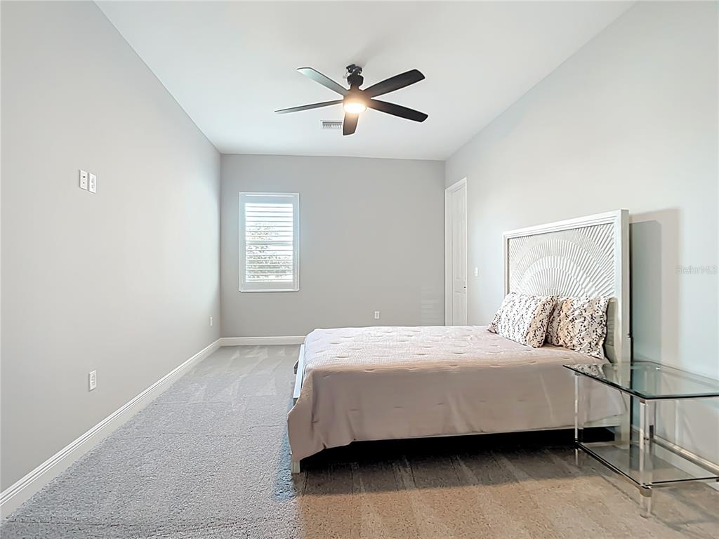 3586 Recurve Circle Sarasota, FL 34240 - Photo 38 of 65 a bedroom with a bed and window